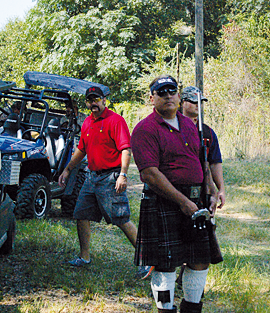 Scottish clad Shelley Miller displays his skills on the true pair (rabbitt) course at Green Lakes Hunting Club in Ocilla. His attire is to honor his membership as a member of the Valdosta Fire Department pipe and drum corps.