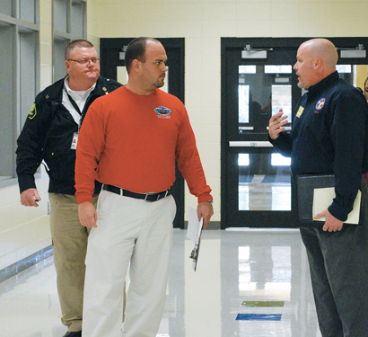 Worth County EMA Director Tom Whittington and WCES Principal Steven Rouse joined GEMA School Safety Coordinator Frank Maneer during a tour of WCES. Maneer was asked to evaluate Worth County schools in an effort to increase safety.